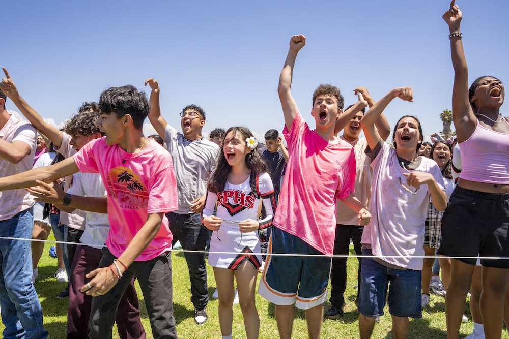Students in a group cheering!