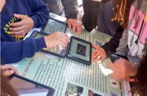science students with electronic tablet