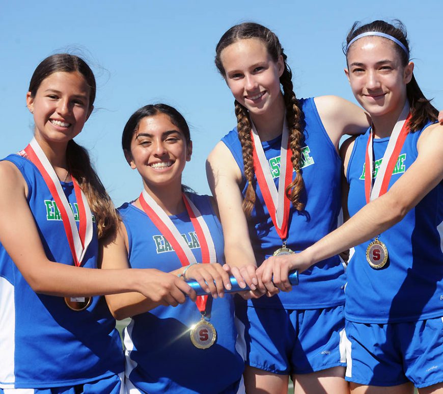 Eastlake girls distance medley relay winners, from left, Tatum Sherard, Bella Alcocer, Kate Robinson and Luz Mercado. Photo by Phillip Brents