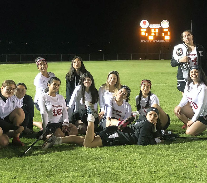 Castle Park team members pose after recording their first win of the season on March 12