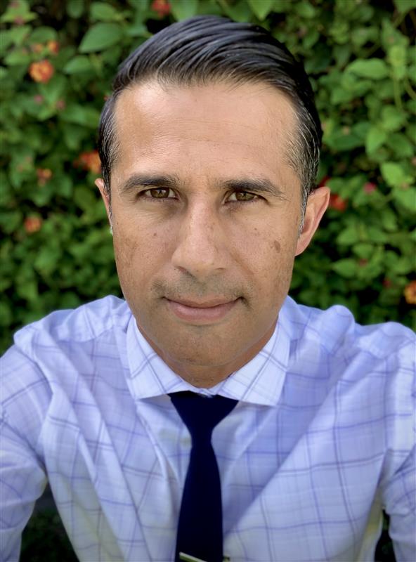 Principal John Patel